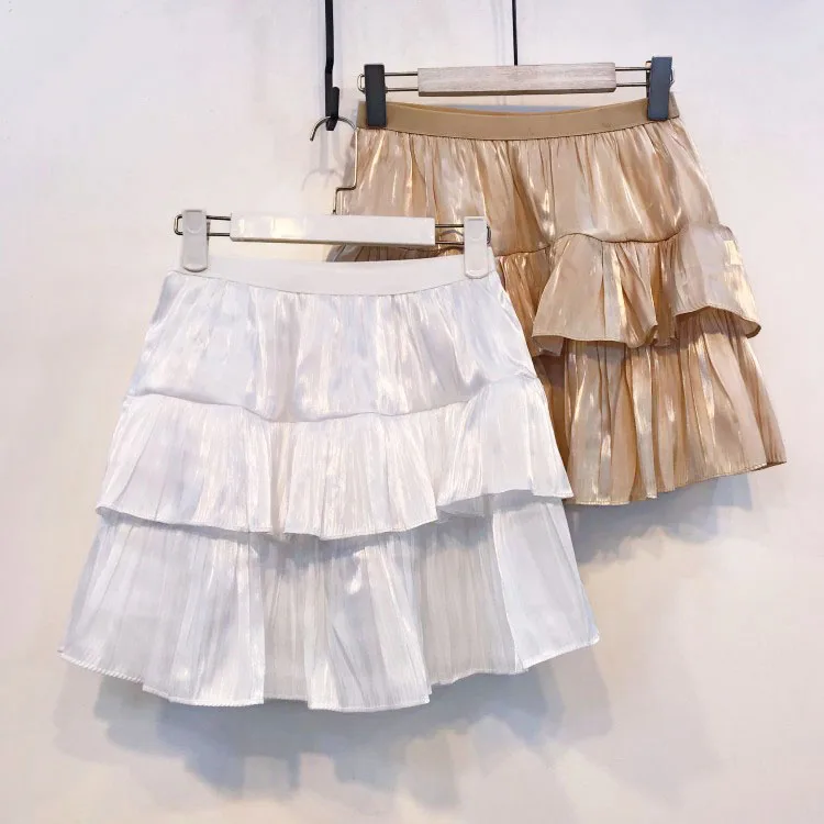 

2019 early spring new women's elastic high waist anti-glare cake casual fashion temperament wild short skirt