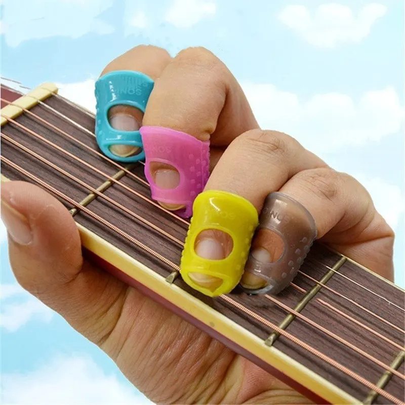 Инструмент для игры на гитаре. Пластиковая штука для гитары. Аксессуары для гитары. Зажим для струн гитары. Инструмент для игры на гитаре.