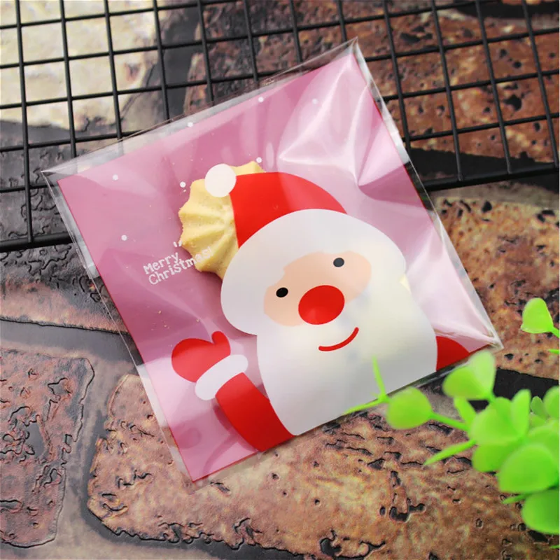 

Hot Christmas Cheap 10pcs/set or 20pcs/lot gift bags Cookie Biscuits Pastic Bag Packaging Wedding Gift Holders Santa Decoration