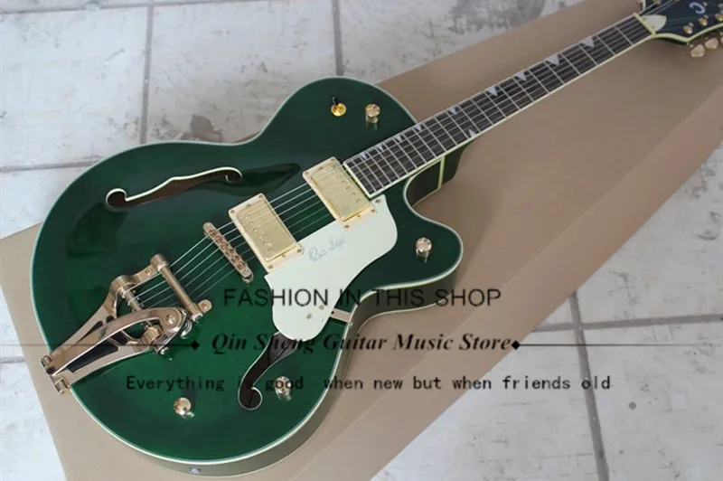 

Green Semi-hollow Electric Guitar with Tremolo System,Golden Pickups,Gold Hardwares,Rosewood fretboard,free shipping