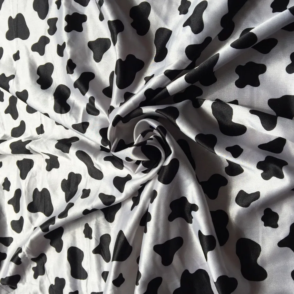 Cow printed satin fabric