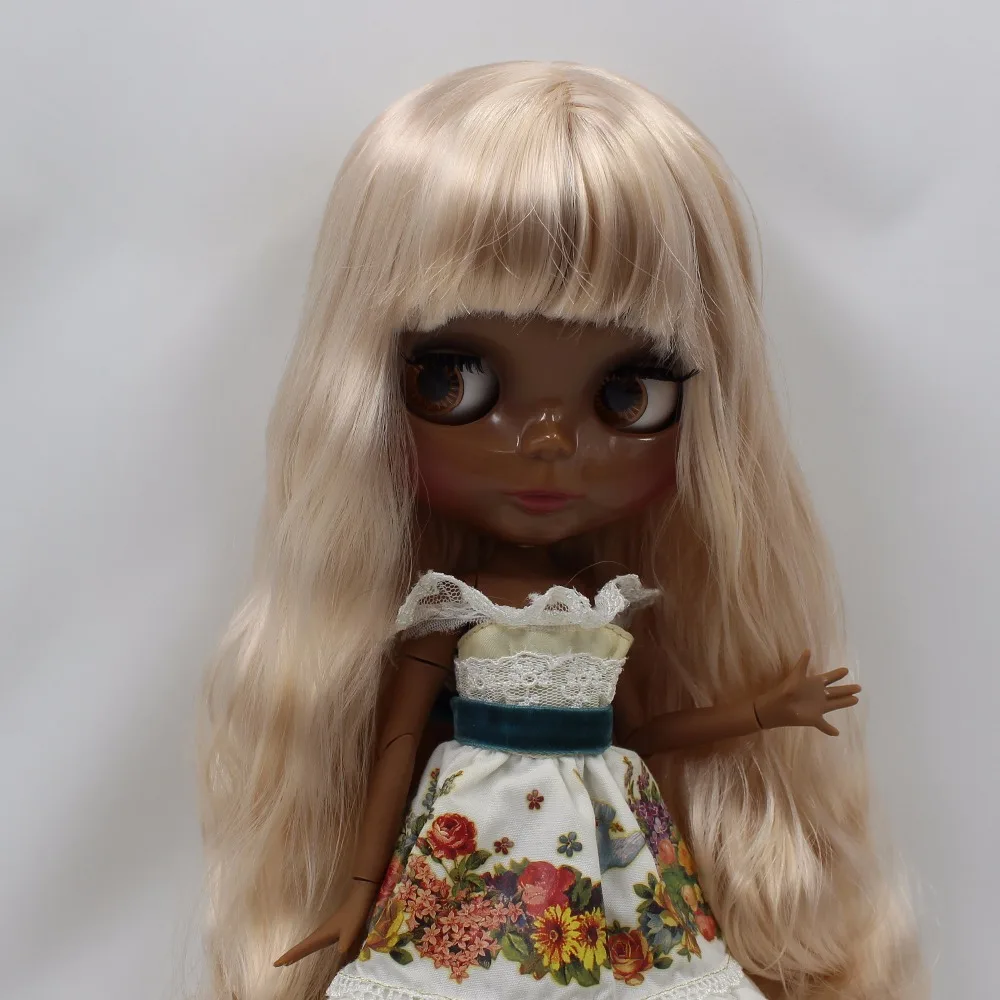 black doll with blonde hair
