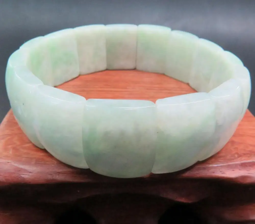

Natural Grade A Jade (jadeite) 22mm H Oblong Bead Bracelet 10.16