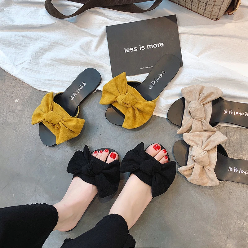 

Slipper female summer wear new Korean version of the bow wild flat social cool slippers female flip-flop beach shoes