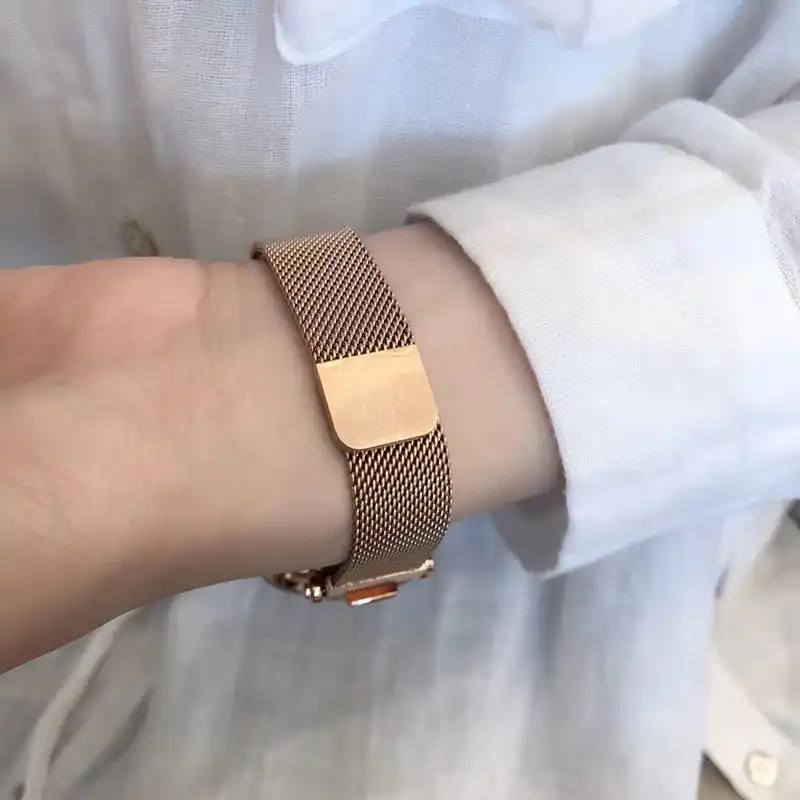 gold stainless steel case with gold milanese loop