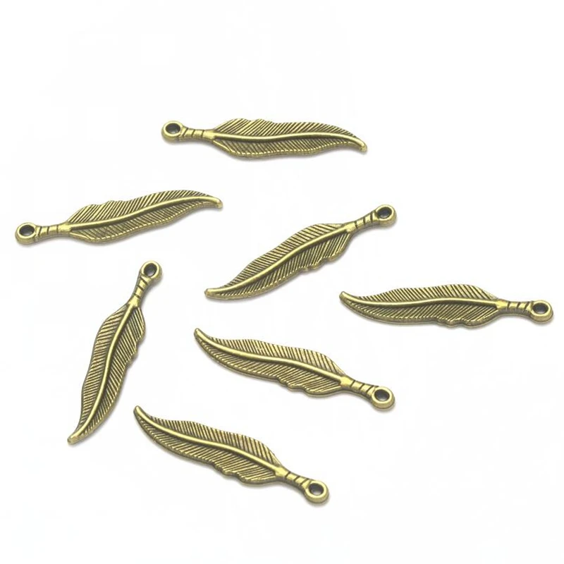

Wholesale Charms 10pcs Antique Bronze Alloy Leaves Feather Charm Pendant Necklace Jewelry & Accessories Findings 34X7.5mm A108
