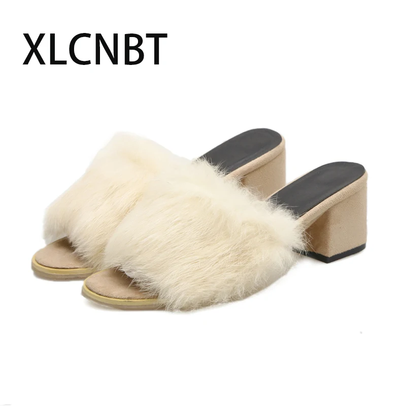 fluffy high heeled black slippers