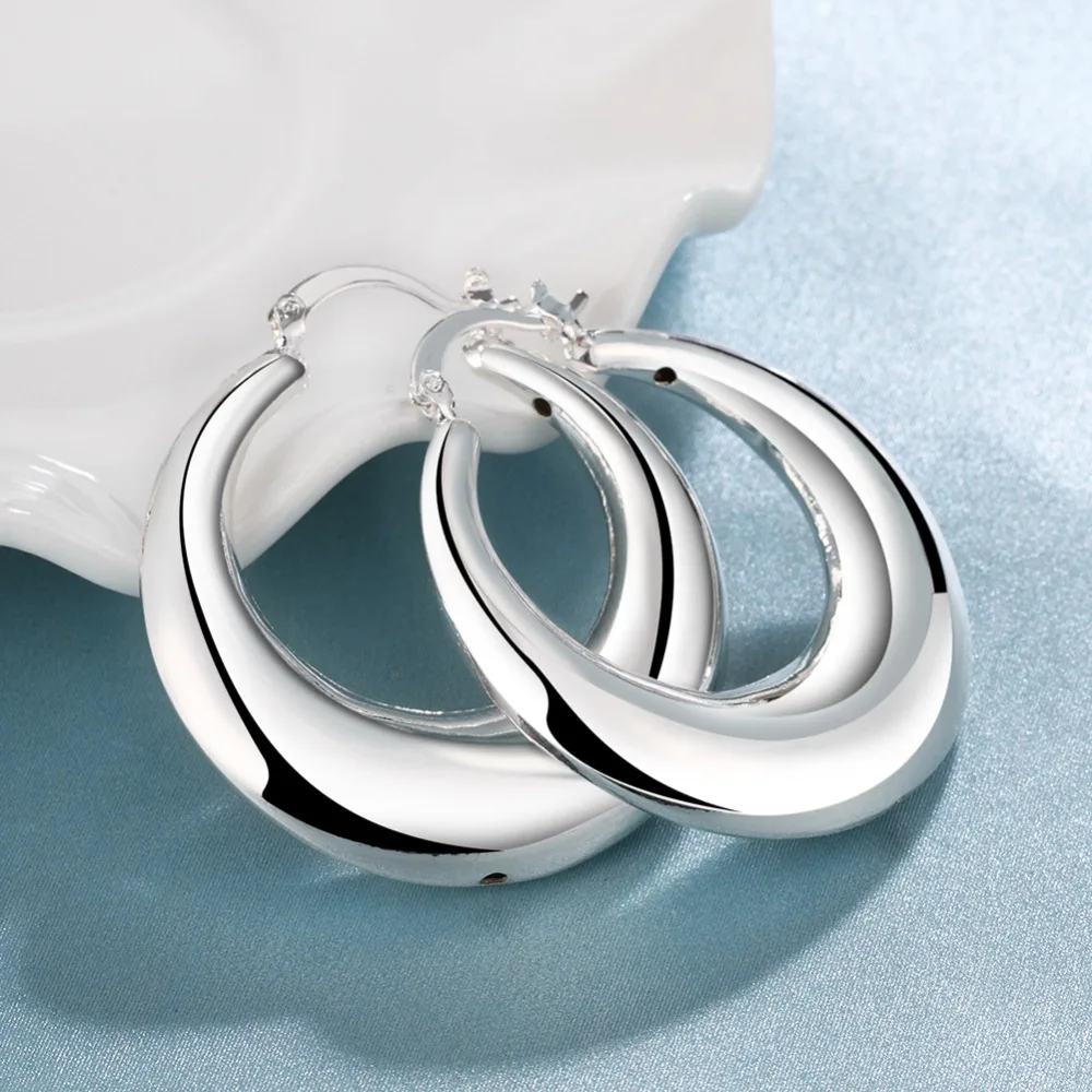 

Brand New Jewelry fashion Silver jewlery charming women earrings silver round earrings