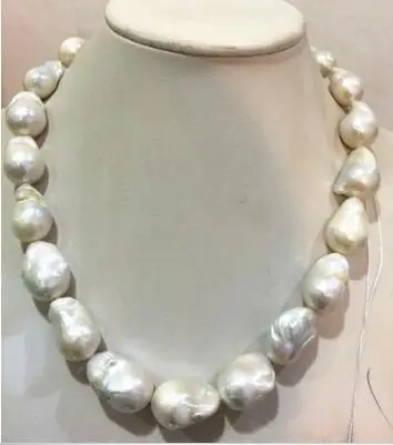 

SOUTH SEA GENUINE WHITE BAROQUE PEARL NECKLACE 18 INCH 10mm solid gold CLASP Be the first to write a review.
