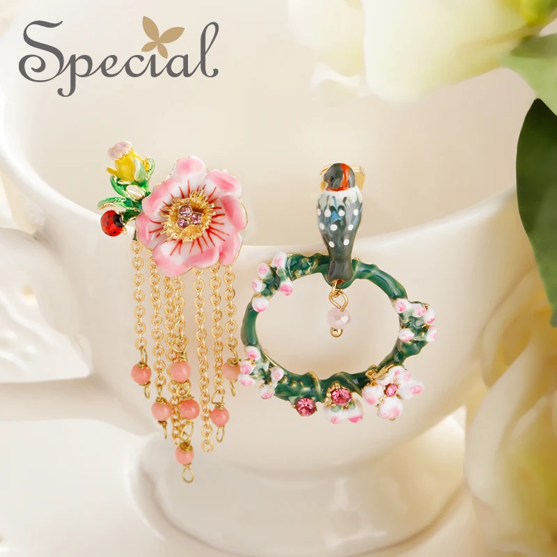 

The SPECIAL New Fashion euramerican sterling 925 Silver needle Ear Nail System Asymmetrical Ear Ears and Green Bird. S1896E