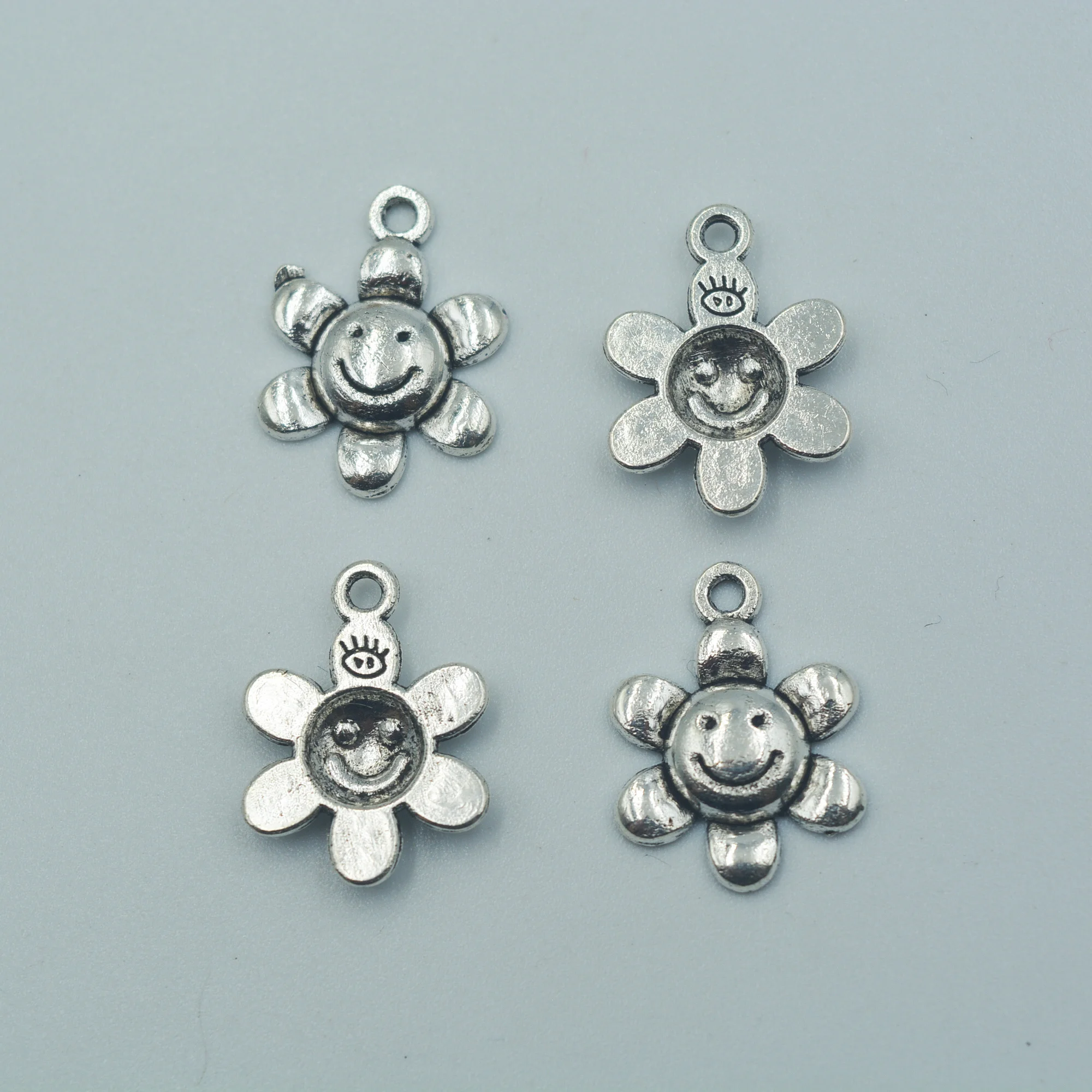 

30PCS Hot sell alloy silver plated face charms Sunflower charms flower charms for jewelry findings