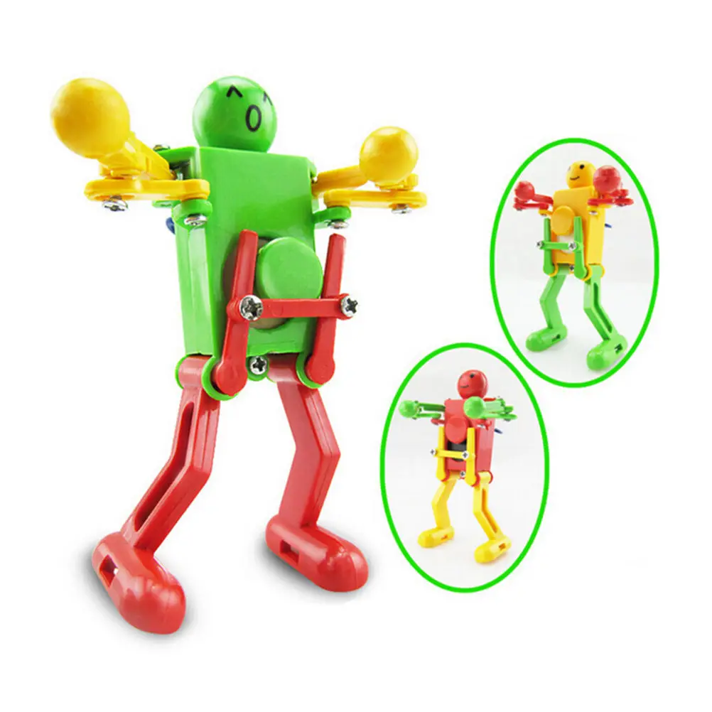 2Pcs/lot Robot Clockwork Spring Wind Up Toy Dancing Toy for Children