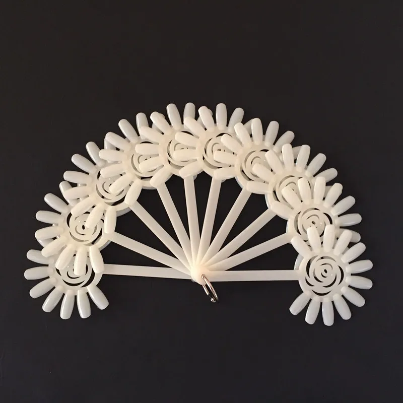 

2bags/lot (10pcs/bag) False Nail Art Sticks Tips Stick Polish Display Practice Tool Fan Nude Clear New