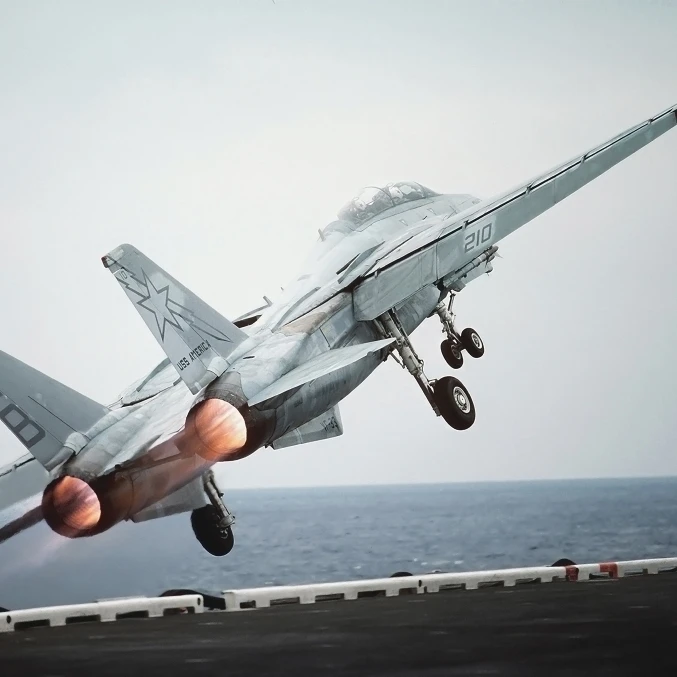 A F-14A Tomcat aircraft is launched from the nuclear-powered aircraft carrier USS Theodore Roosevelt Print (17 x 11)