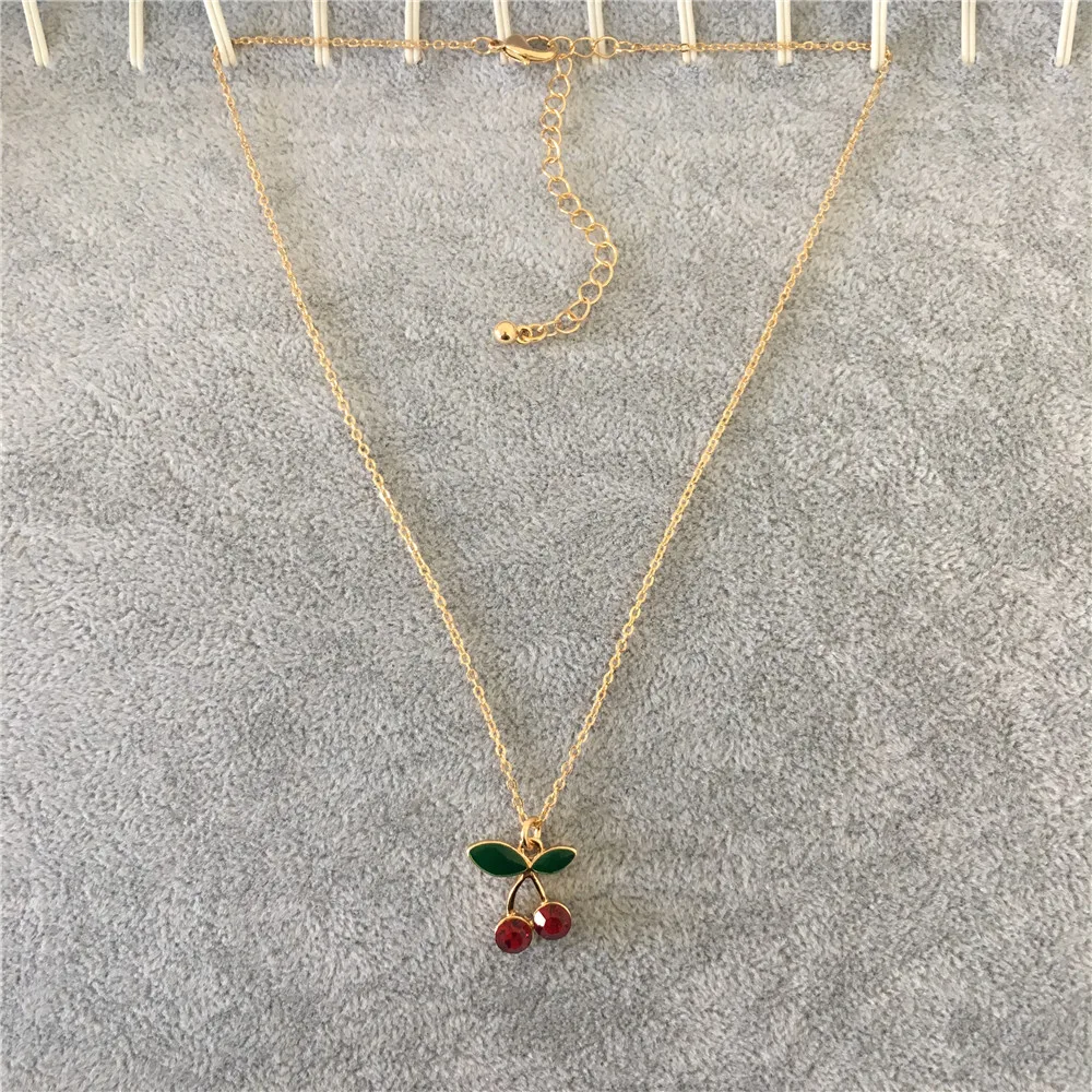 Милые женщины ожерелье с покрытием золотого цвета зеленый лист красный камень вишня кулон ожерелье