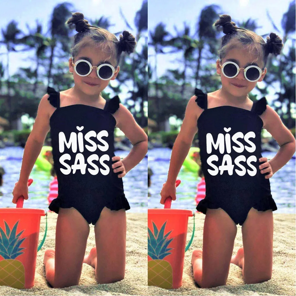 Лучшие продажи с оборками для маленьких девочек письмо дети купальник черный пляжная Купальники узор Единорог дети купальники fato de Banho