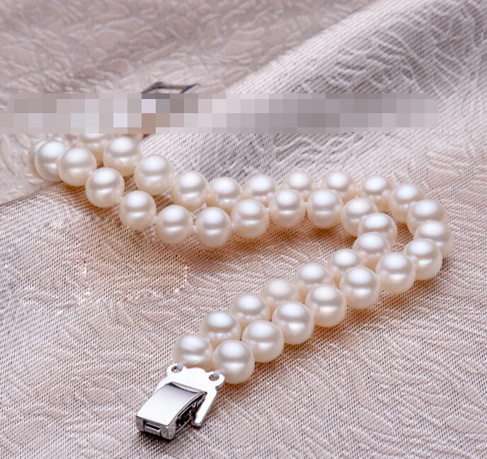 

1003 round white akoya cultured pearl bracelet