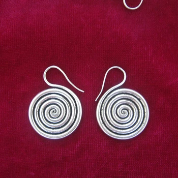 

Guizhou handmade jewelry Miao jewelry handmade Miao silver personality earrings \ small vortex