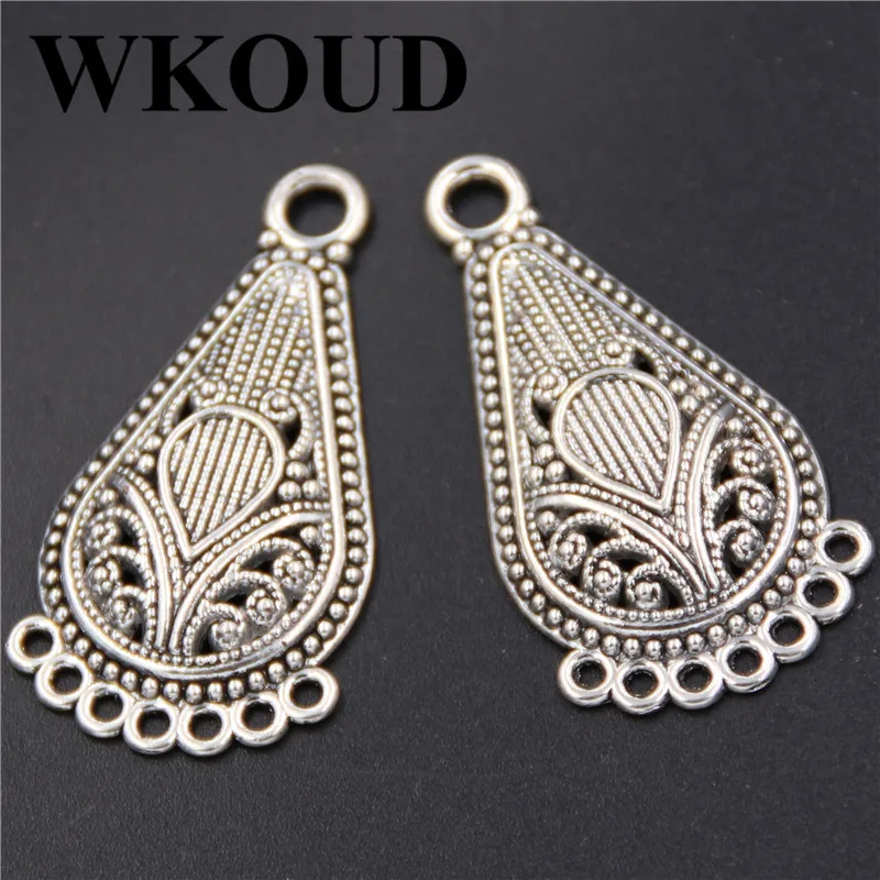 

WKOUD 15pcs Alloy Tibetan Silver Symmetrical Tear Drop Flower Hollow Filigree Pendant Charm Connector A194