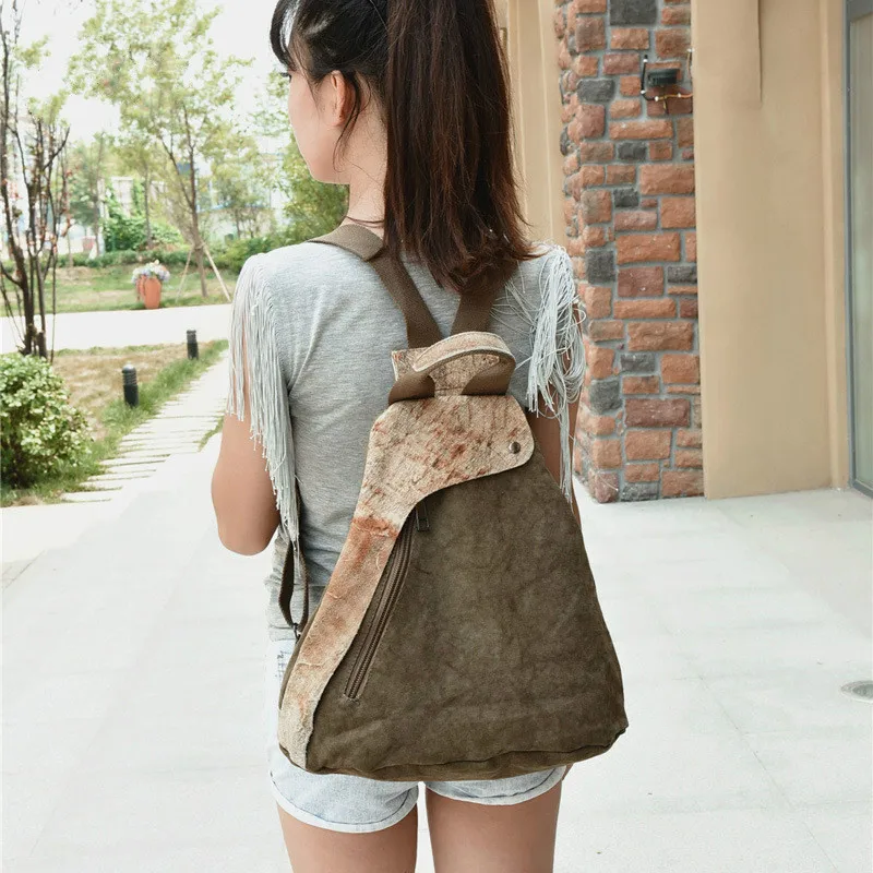 

New Canvas Women's Backpack Leisure Travel Multi-function Bag Creative Cowhide Canvas Stitching Backpack