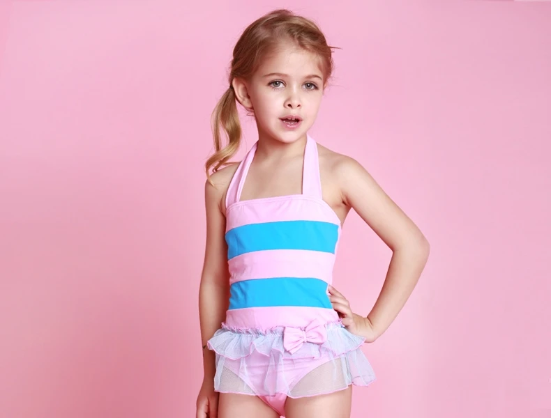 young girls in swimming costumes