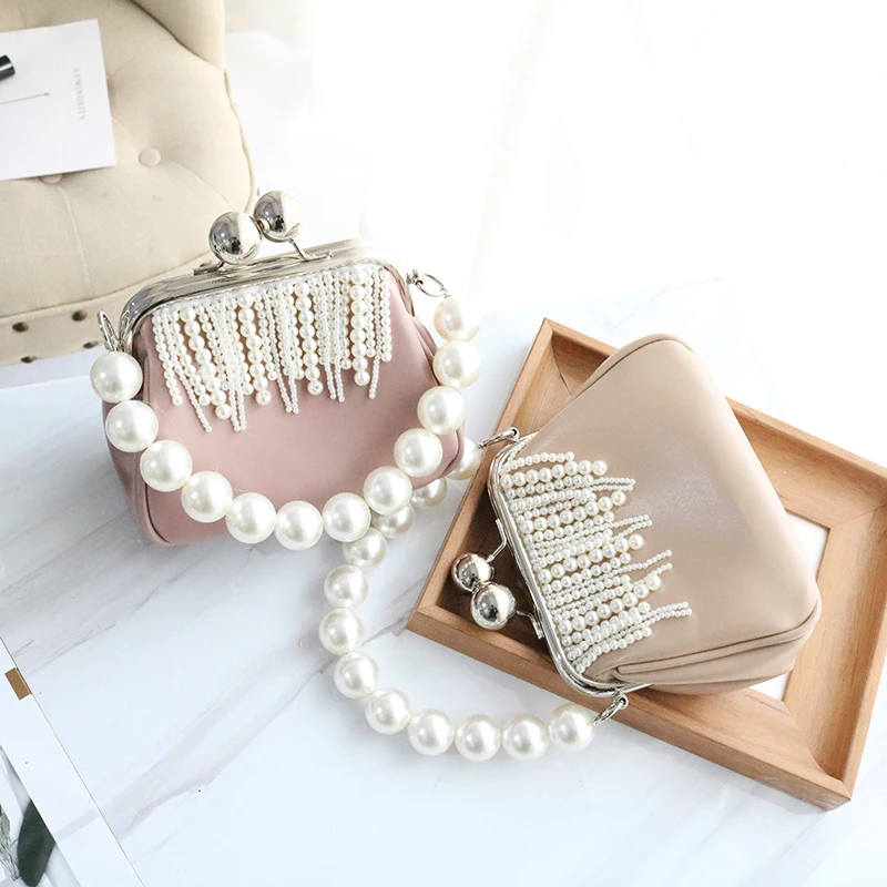 

2019 spring new fashion women's bag pearl handbag string beads flow Su small bag hand-held one shoulder satchel bag