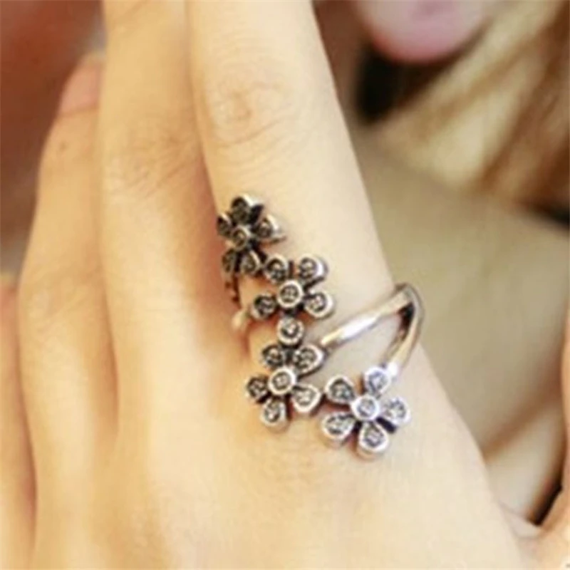 Summer real Beautiful girl rings Korean jewelry Four small plum style flower vintage ring Cheap