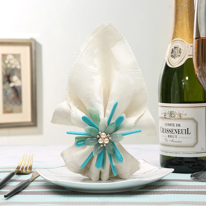 

10pcs Creative new blue flower napkin buckle Chinese restaurant model room hotel set table alloy napkin ring napkin rings