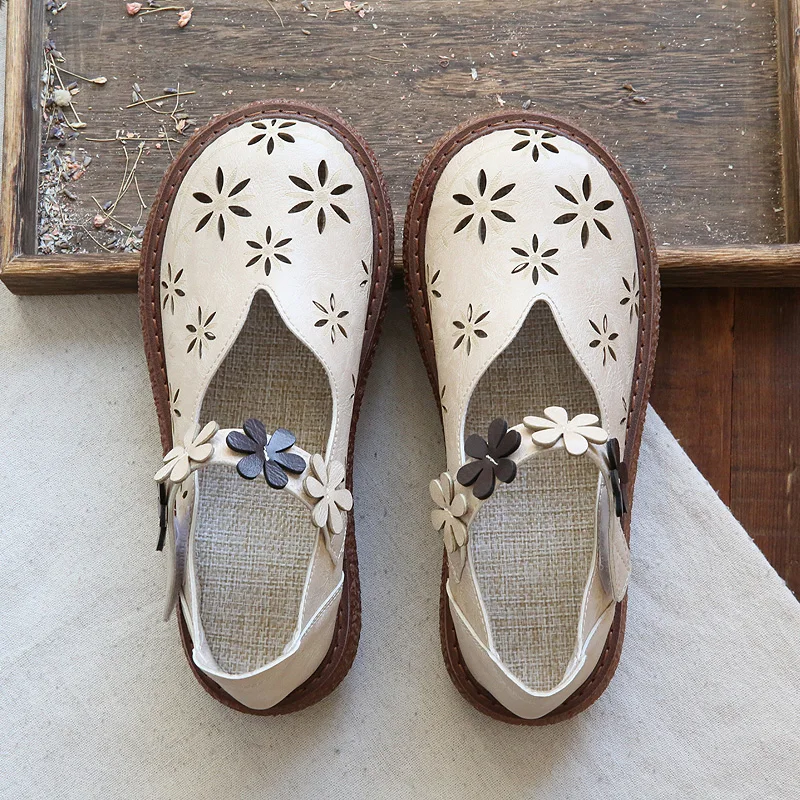 

Mori female literary retro hollow petals round head thick-soled big shoes cotton and linen casual doll shoes