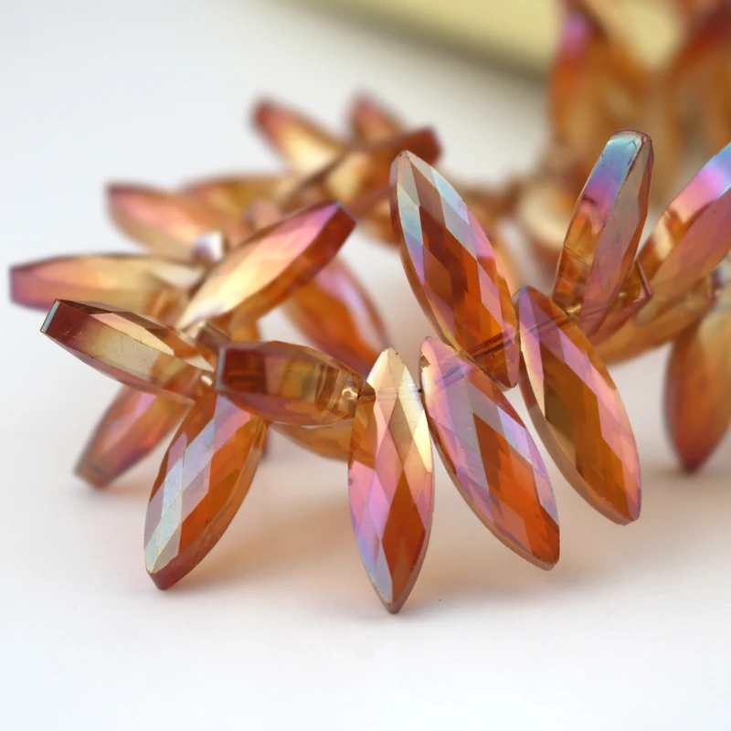 

Cheap Chinese Faceted Crystal Charm Beads 50x 7*22mm Orange AB Plated Fancy Jewelry Necklace Craft Curtain Light DIY Making