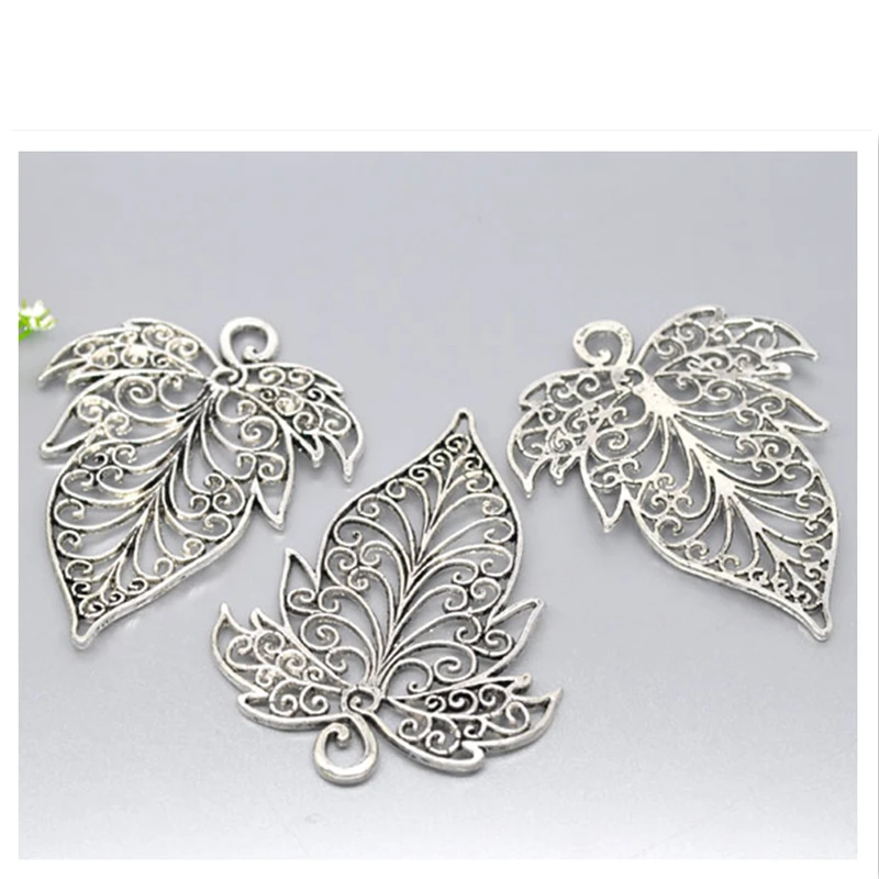 Подвеска ажурный листик. Резные листья из бумаги. Ажурные веточки вязание спицами. Монстера серебро. Резной листик.