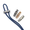 30 unids/lote 3 colores de aleación de metal tapones trabas para cordón de cambio de bloqueo de dos agujeros para cable de 4mm de níquel negro oro STP-017 ► Foto 1/6