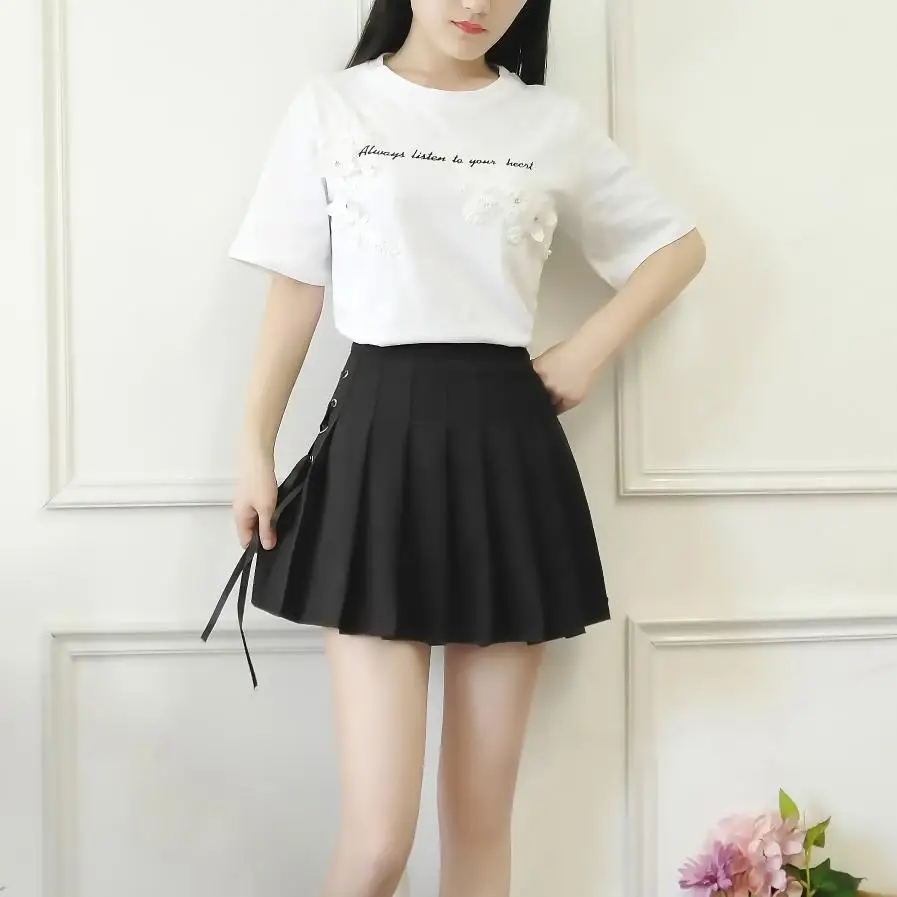 white t shirt and black skirt