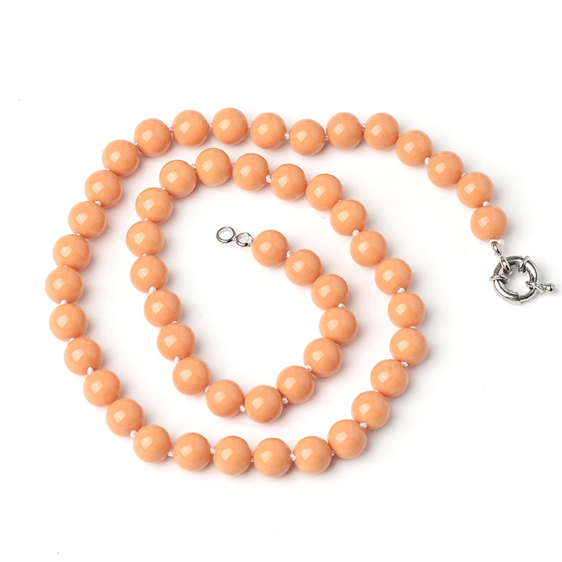 

Smooth and full add round with of Uniform size Orange-yellow Beads 8 MM Synthesis Amber Necklace.The Christmas best gift