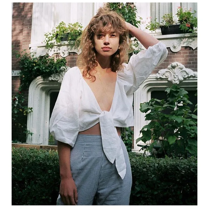 

Spring Lantern Sleeve Lace Up Women Loose Shirt Sexy Fashion Deep V-Neck Solid Beach Blouse Casual Solid Bandage Crop Tops