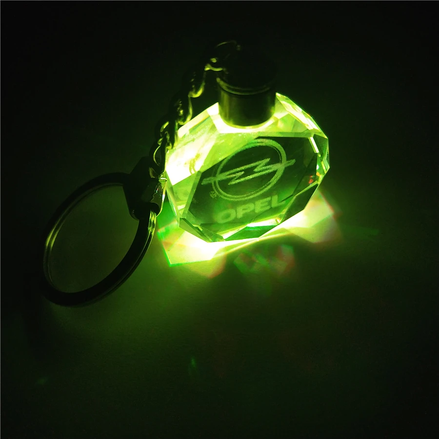 

LED light with 5 color Emblem Badge Car Keychain Key Ring for OPEL Corsa Insignia Astra Antara Meriva Car Styling Accessories