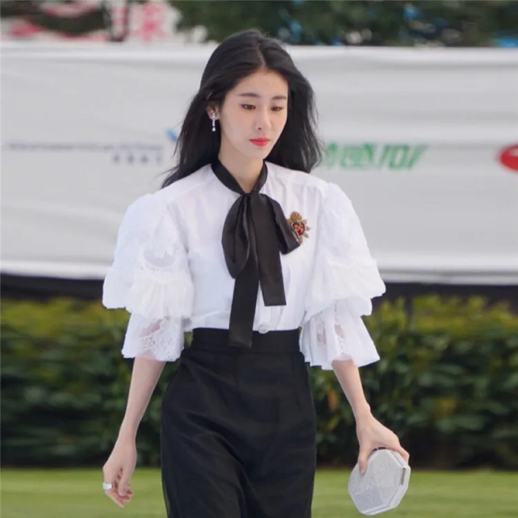 

New wind system with white palace with lace stitching OL shirt + black gauze skirt suit F0347