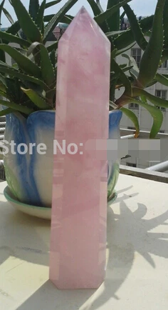 

A NATURAL ROSE QUARTZ CRYSTAL WAND POINT (0601)