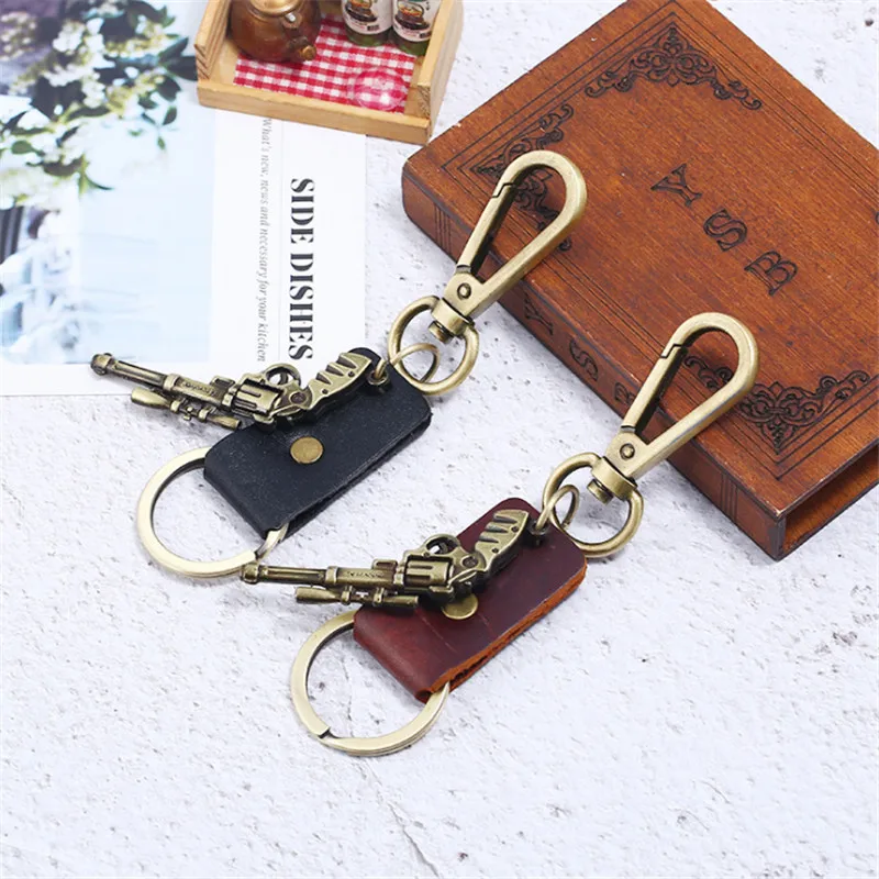 Fashion Men Revolver Bronze Pistol Weapon Keychain Leather Key Rings Newest Gun key Chain For Women Charm Jewelry Surprise Gifts