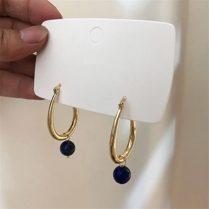 

AOMU 2019 Korean Simple Metal Gold Hollow Oval Dark Blue Beads Tassel Loop Hoop Earrings for Women Oorbellen Gifts Party Jewelry