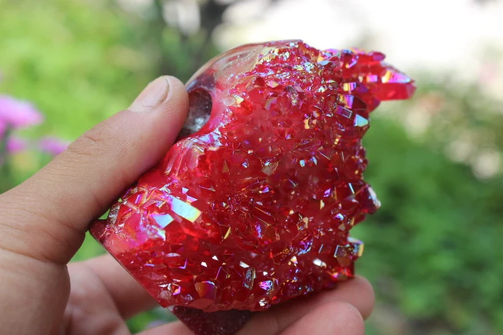 

411 grams of natural red halo of quartz crystal skull specimen cluster