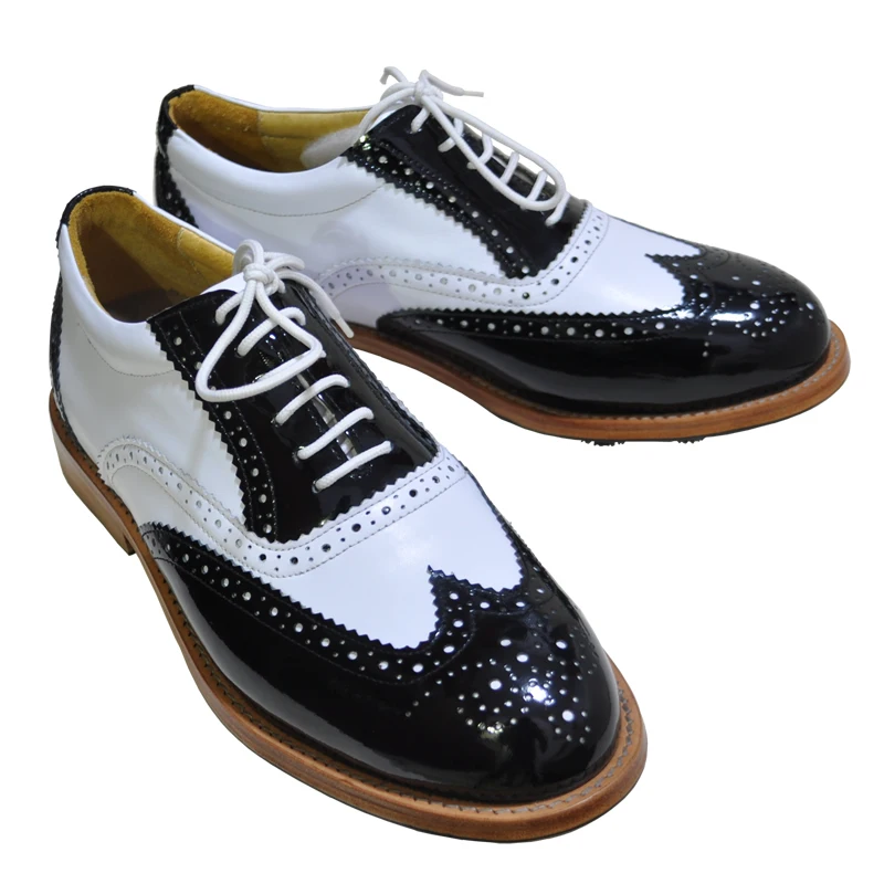 black white golf shoes