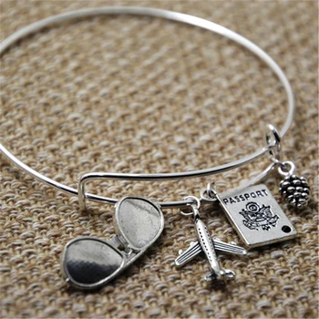 

12pcs Traveler-Bracelet with passport airplane and sunglasses for the world traveler