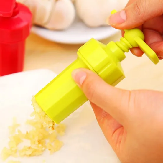 

1PC New Kitchen Ginger Garlic Manual Press Twist Cutter Crusher Cooking Tool Plastic Garlic Presses Blenders Peeler LF 097