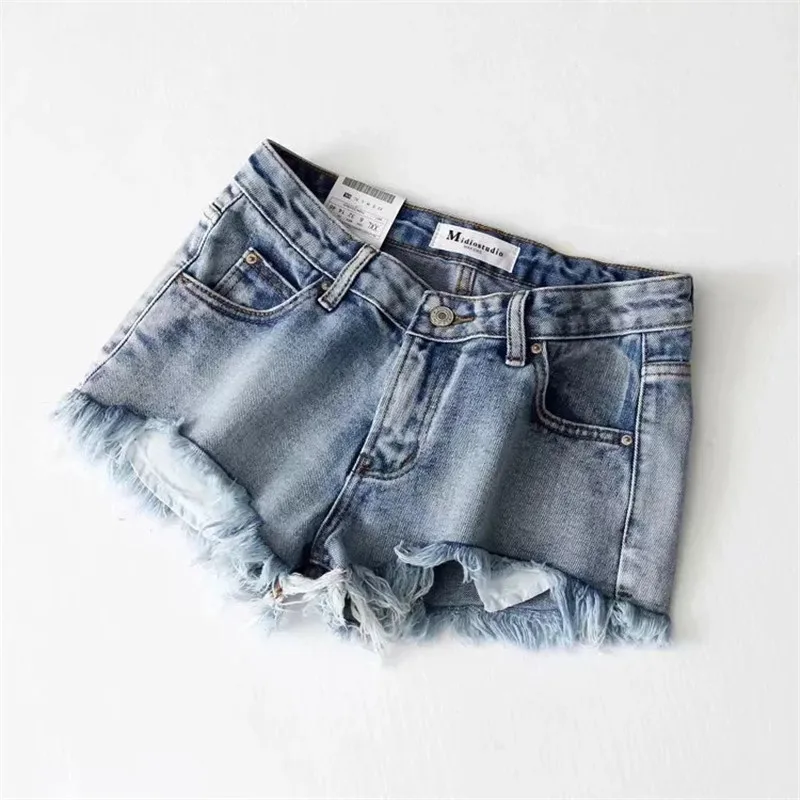 Летние модные стильные женские джинсовые шорты с потертостями, повседневные синие джинсовые шорты с кисточками, популярные шорты для девочек