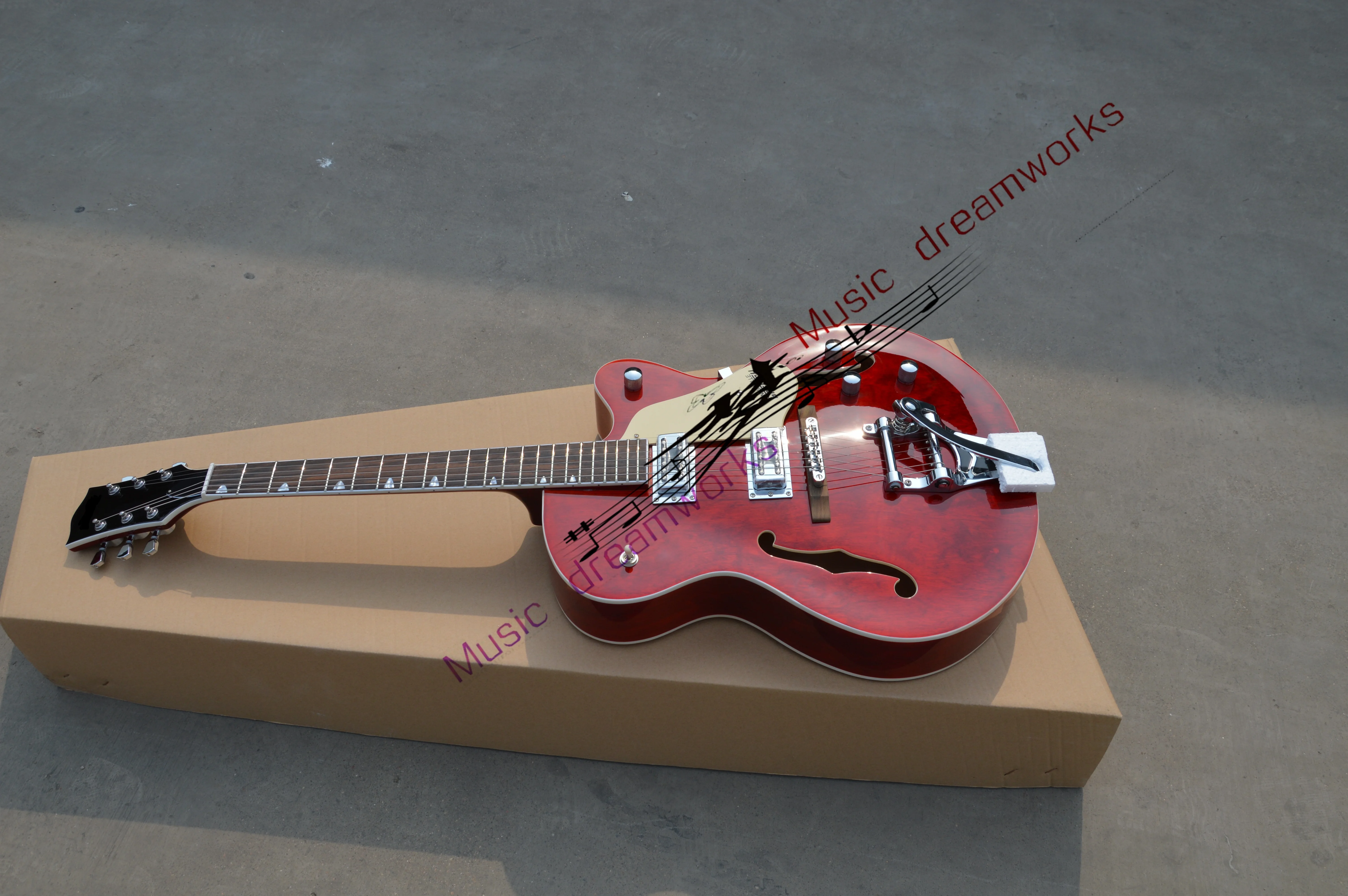 

China firehawk electric guitar RED color Hollow jazz guitar, big jazz tremolo system, Chrome hardware Free shipping