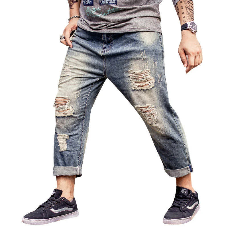 

Tide brand Loose Elastic Men's Nine-point jeans Spring Modis cat must wear White Hole Worn Old jeans Ripped jeans for men