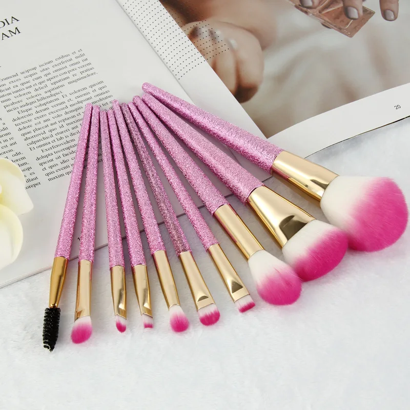 A new set of 10 pointed bottom makeup brushes, cherry blossom powder