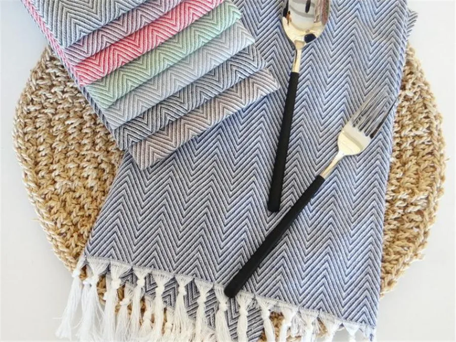 

Textile Napkin with Tassel Handmade Reusable Woven Handicraft Home Use Kitchen Towel Fabric Tablemat Background Coffee tea pad