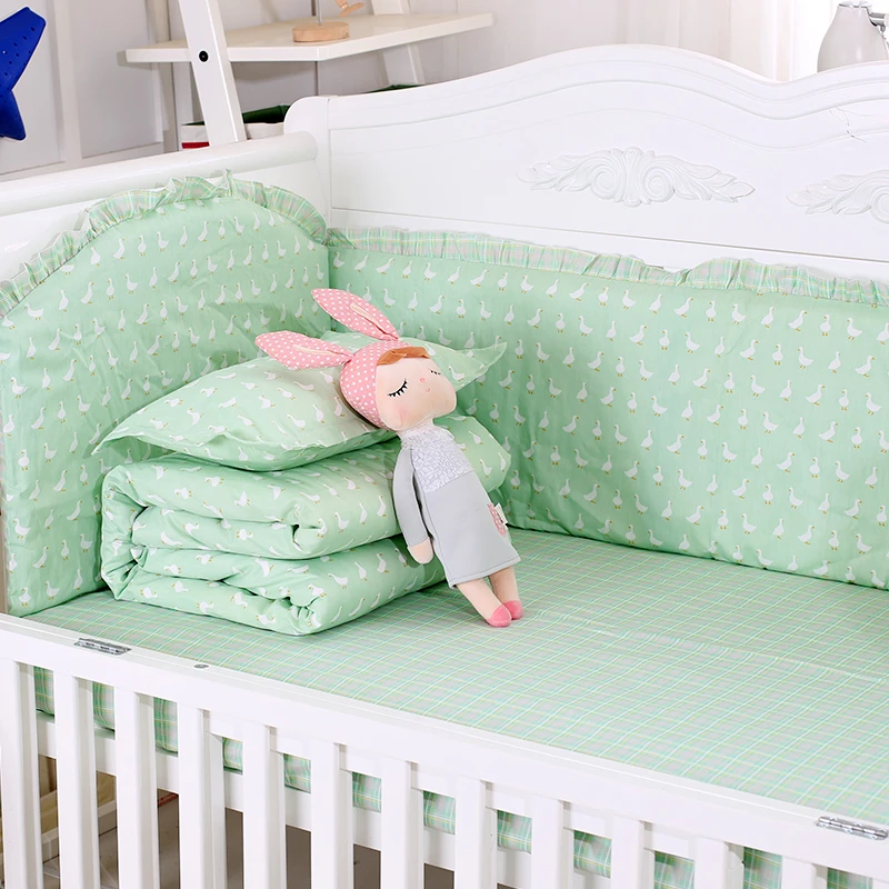 green baby crib